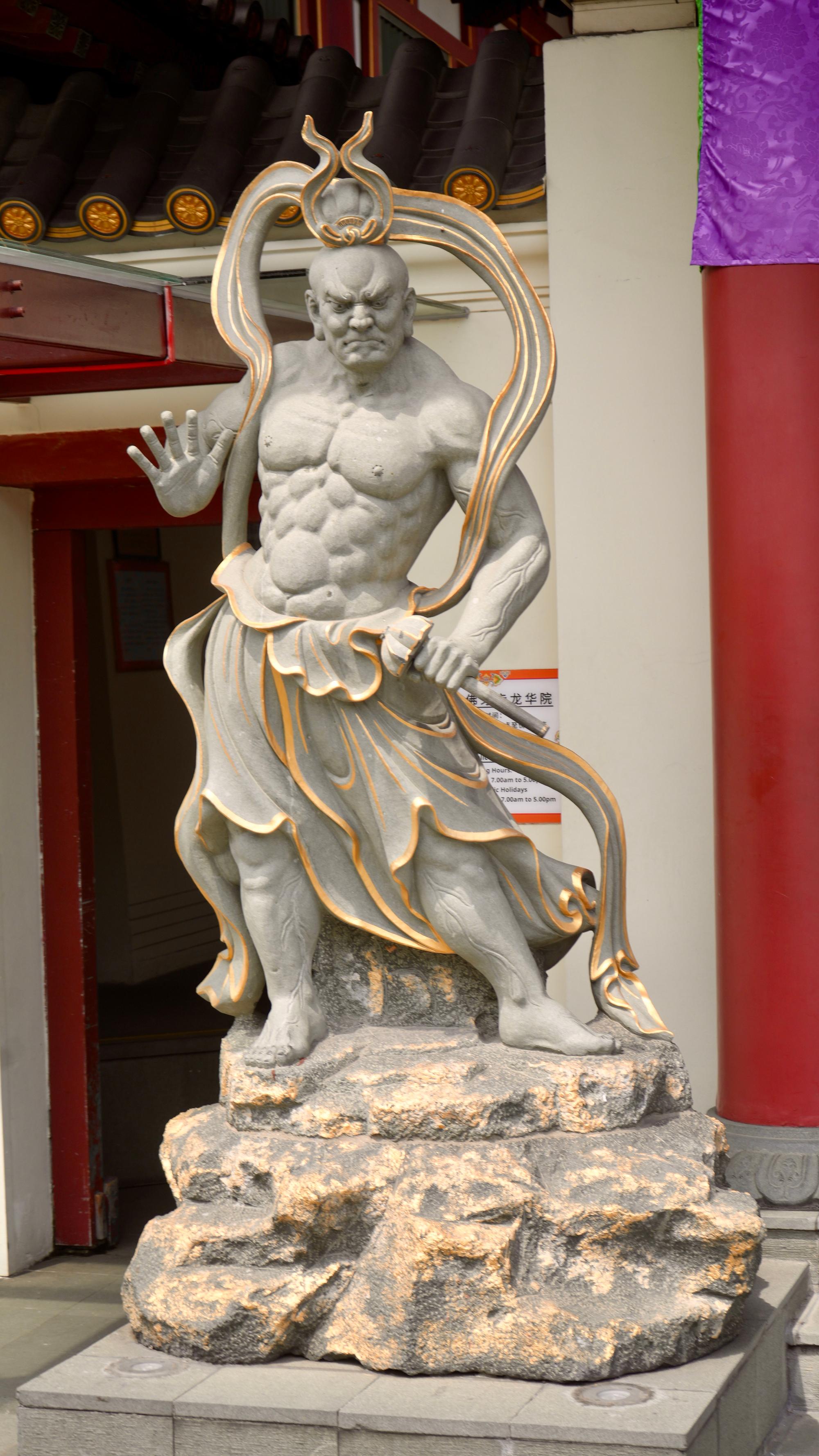 At entrance of Buddha Tooth Museum