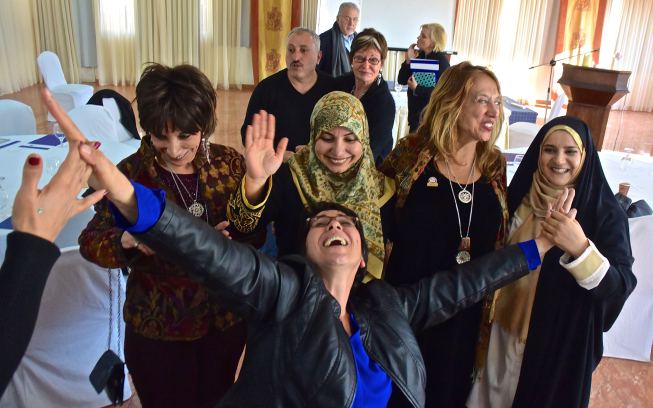 Having fun at the end of the conference. Jean Watson is in the back.