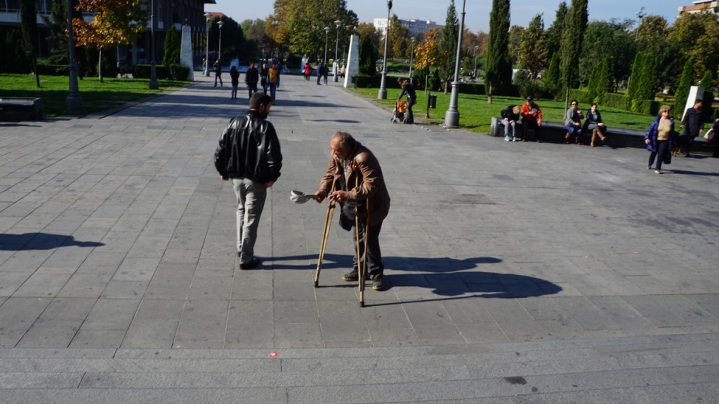 Beggar outside the main cathedral.