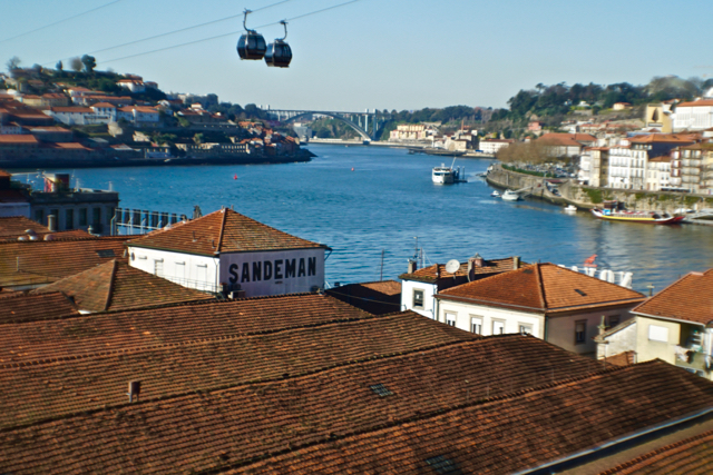 In the foreground, Sandeman Wine warehouses. Porto supposedly has the greatest wine storage of any city in the world..