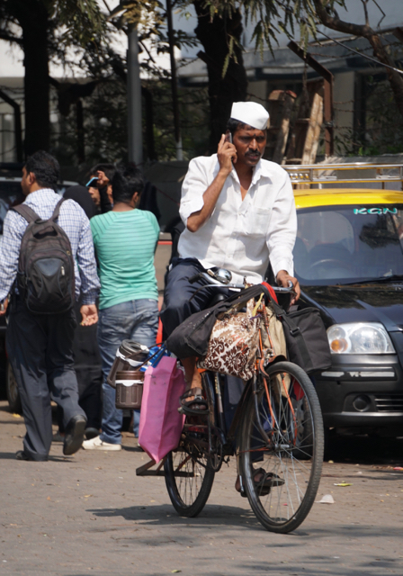 A common sight: Chatting while biking