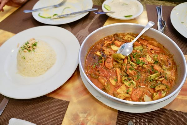 Stewed vegetables, rice, and tahini for the vegan